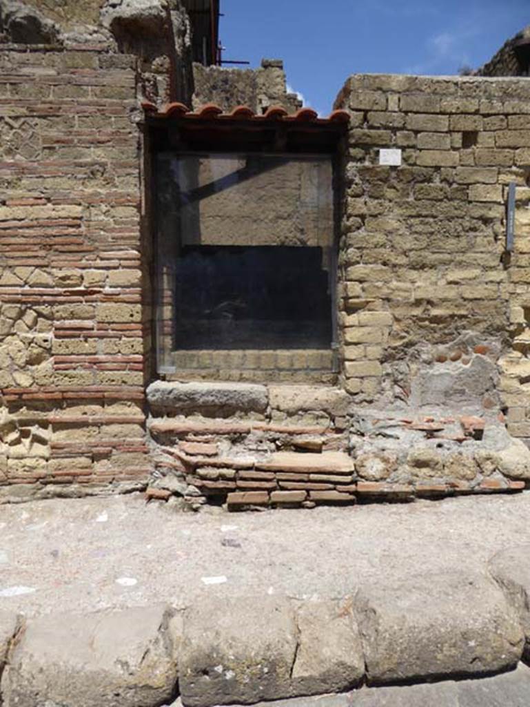 IV.20 Herculaneum, September 2015. Looking west to entrance doorway to steps of carbonised wood, protected by glass. Photo courtesy of Michael Binns.